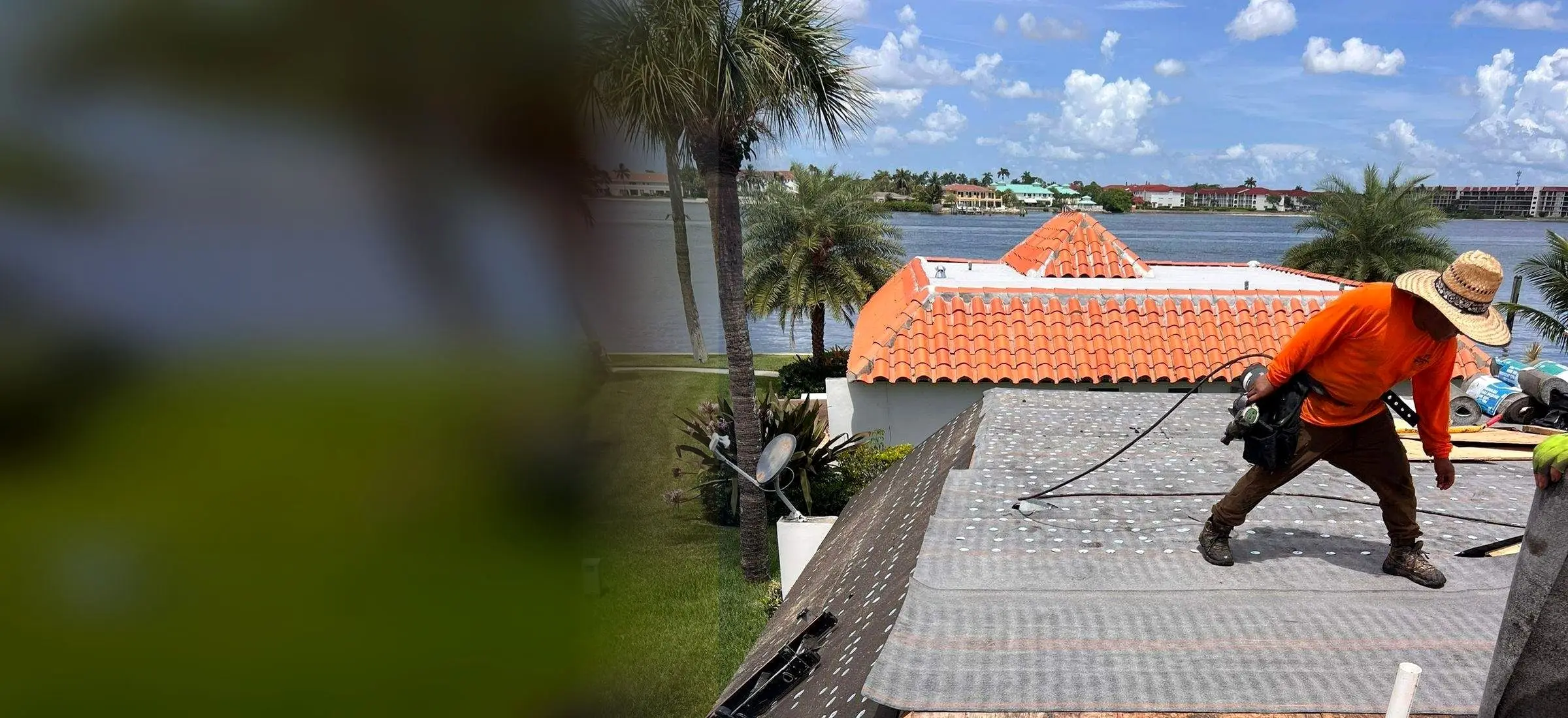 PSR crew member laying underlayment on a roof beside the water, with a clay tile roof and palm trees behind